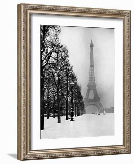 Heavy Snow Covers the Ground Near the Eiffel Tower-Dmitri Kessel-Framed Photographic Print