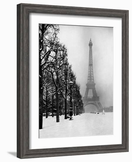 Heavy Snow Covers the Ground Near the Eiffel Tower-Dmitri Kessel-Framed Photographic Print