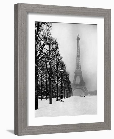Heavy Snow Covers the Ground Near the Eiffel Tower-Dmitri Kessel-Framed Photographic Print