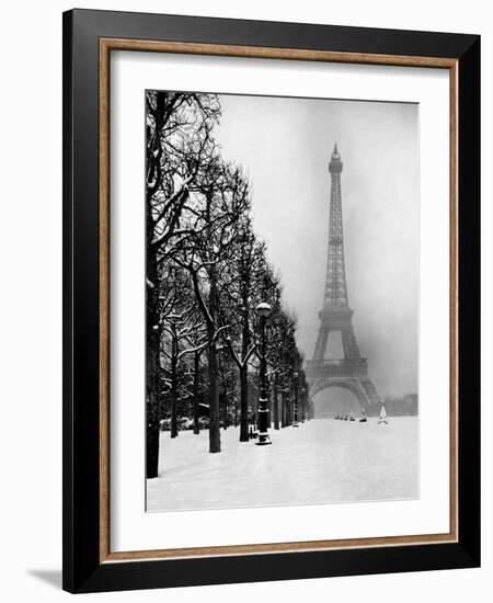 Heavy Snow Covers the Ground Near the Eiffel Tower-Dmitri Kessel-Framed Photographic Print