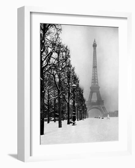 Heavy Snow Covers the Ground Near the Eiffel Tower-Dmitri Kessel-Framed Photographic Print