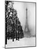 Heavy Snow Covers the Ground Near the Eiffel Tower-Dmitri Kessel-Mounted Photographic Print