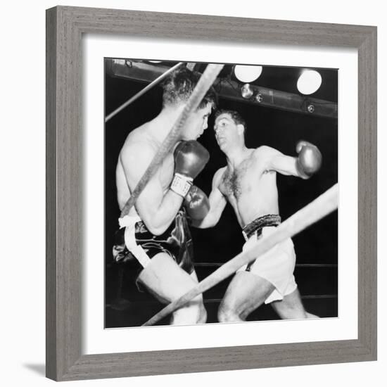 Heavyweight Champion Rocky Marciano (Right) Backs Roland Lastarza Against the Ropes-null-Framed Premium Photographic Print