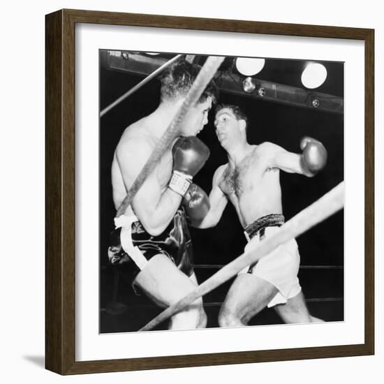 Heavyweight Champion Rocky Marciano (Right) Backs Roland Lastarza Against the Ropes-null-Framed Premium Photographic Print