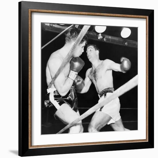 Heavyweight Champion Rocky Marciano (Right) Backs Roland Lastarza Against the Ropes-null-Framed Premium Photographic Print