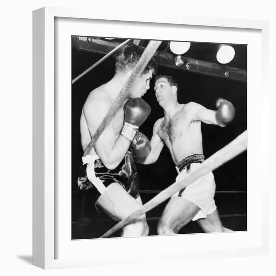 Heavyweight Champion Rocky Marciano (Right) Backs Roland Lastarza Against the Ropes-null-Framed Premium Photographic Print