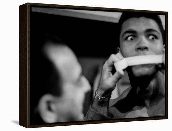 Heavyweight Contender Cassius Clay, Getting His Mouth Taped by Trainer Angelo Dundee-George Silk-Framed Premier Image Canvas