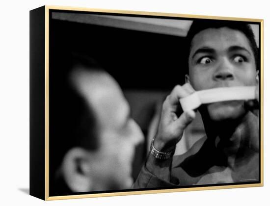 Heavyweight Contender Cassius Clay, Getting His Mouth Taped by Trainer Angelo Dundee-George Silk-Framed Premier Image Canvas