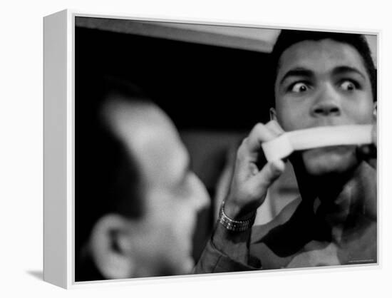 Heavyweight Contender Cassius Clay, Getting His Mouth Taped by Trainer Angelo Dundee-George Silk-Framed Premier Image Canvas