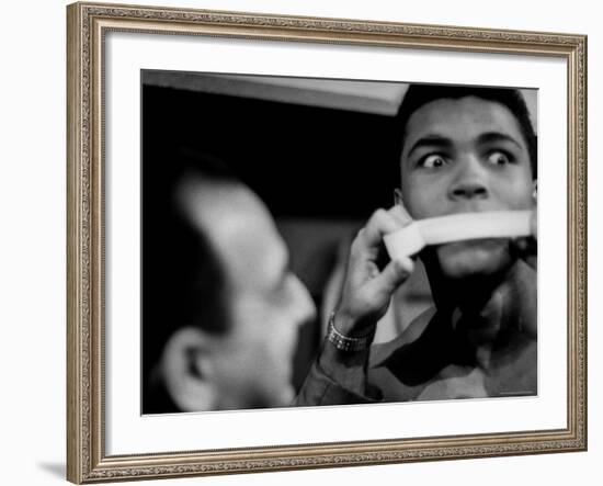 Heavyweight Contender Cassius Clay, Getting His Mouth Taped by Trainer Angelo Dundee-George Silk-Framed Premium Photographic Print