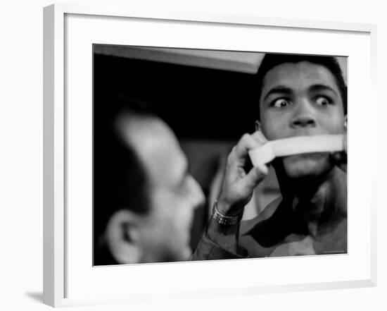 Heavyweight Contender Cassius Clay, Getting His Mouth Taped by Trainer Angelo Dundee-George Silk-Framed Premium Photographic Print