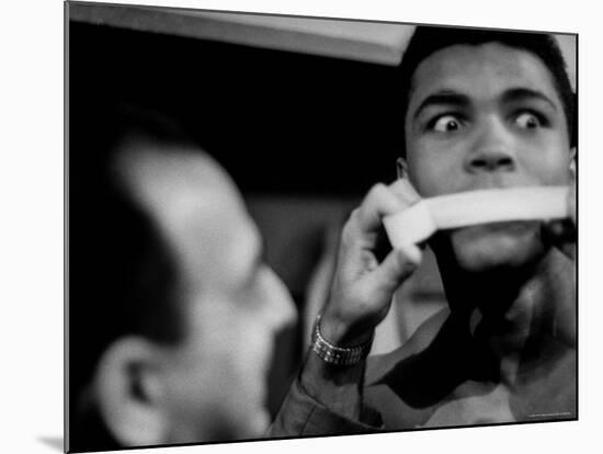 Heavyweight Contender Cassius Clay, Getting His Mouth Taped by Trainer Angelo Dundee-George Silk-Mounted Premium Photographic Print