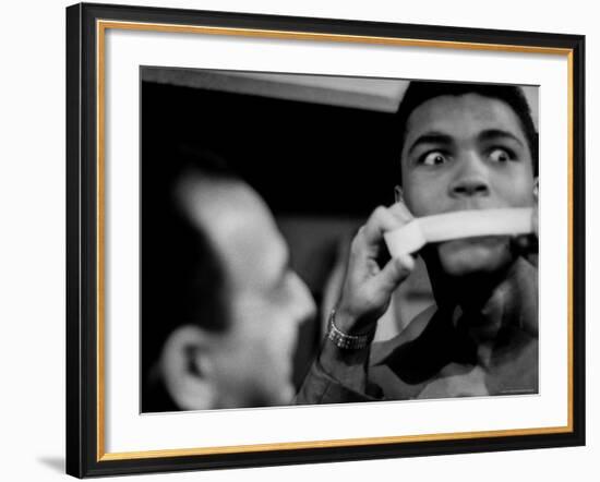 Heavyweight Contender Cassius Clay, Getting His Mouth Taped by Trainer Angelo Dundee-George Silk-Framed Premium Photographic Print