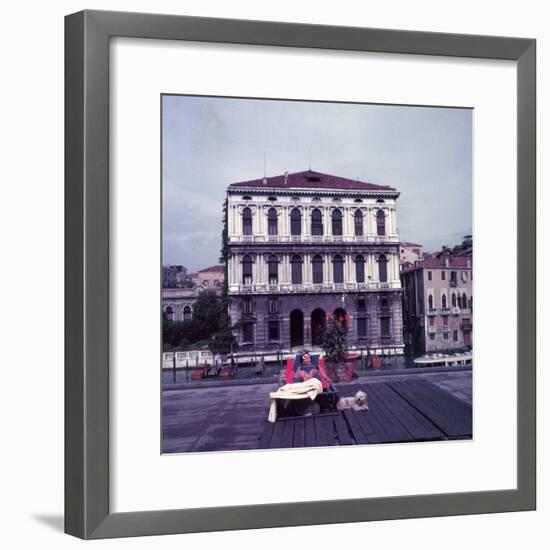 Heiress Peggy Guggenheim Sunbathing on Terrace of Venier Dei Leoni Palace on Grand Canal in Venice-Frank Scherschel-Framed Premium Photographic Print