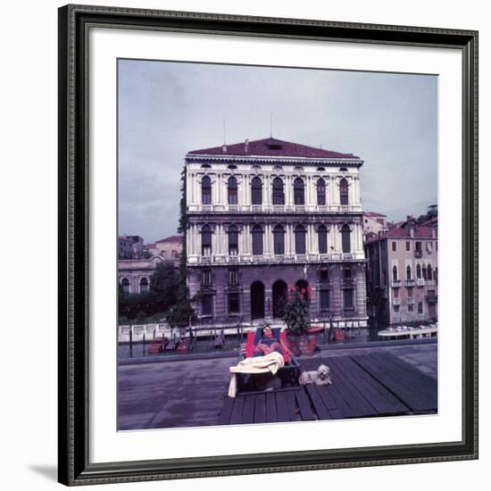 Heiress Peggy Guggenheim Sunbathing on Terrace of Venier Dei Leoni Palace on Grand Canal in Venice-Frank Scherschel-Framed Premium Photographic Print