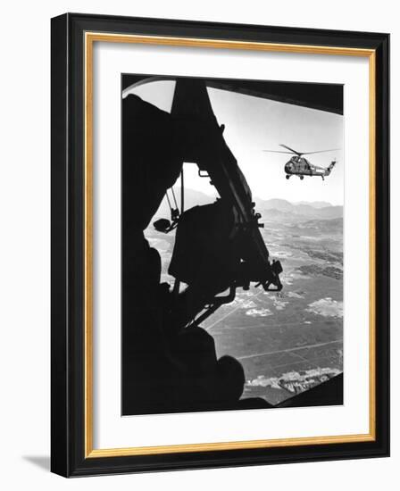 Helicopter And Soldier Approaching Target in Vietnam-Stocktrek Images-Framed Photographic Print