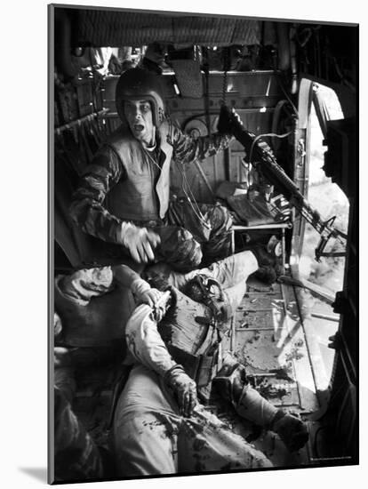 Helicopter Crew Chief James C. Farley Shouting to Crew as Wounded Comrades Lay Dying at His Feet-Larry Burrows-Mounted Photographic Print