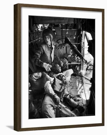 Helicopter Crew Chief James C. Farley Shouting to Crew as Wounded Comrades Lay Dying at His Feet-Larry Burrows-Framed Photographic Print