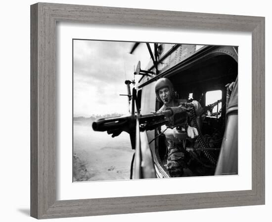 Helicopter Crew Chief James Farley Using M-60 Machine Gun in Landing Zone Near Da Nang-Larry Burrows-Framed Photographic Print