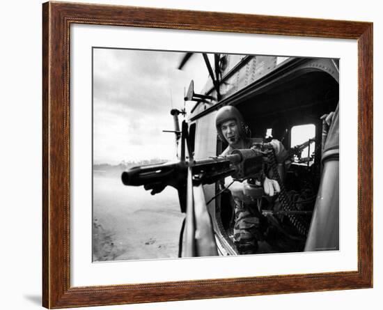 Helicopter Crew Chief James Farley Using M-60 Machine Gun in Landing Zone Near Da Nang-Larry Burrows-Framed Photographic Print