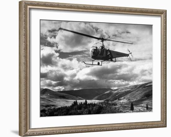 Helicopter Flying in Unidentified Location-Margaret Bourke-White-Framed Premium Photographic Print