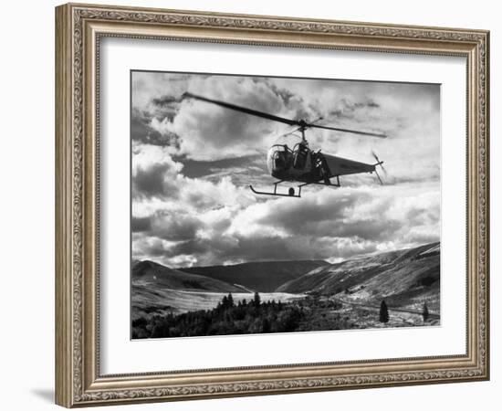 Helicopter Flying in Unidentified Location-Margaret Bourke-White-Framed Photographic Print
