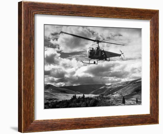 Helicopter Flying in Unidentified Location-Margaret Bourke-White-Framed Photographic Print