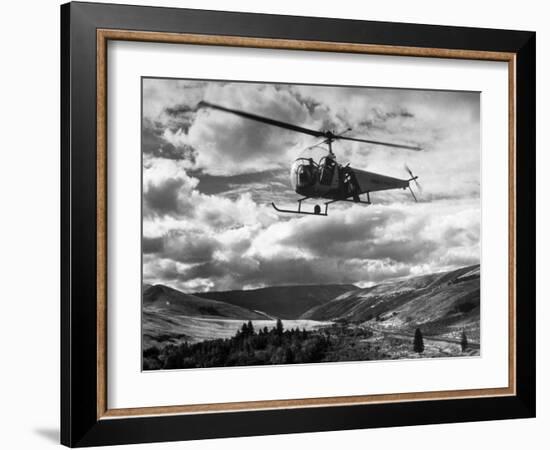 Helicopter Flying in Unidentified Location-Margaret Bourke-White-Framed Photographic Print