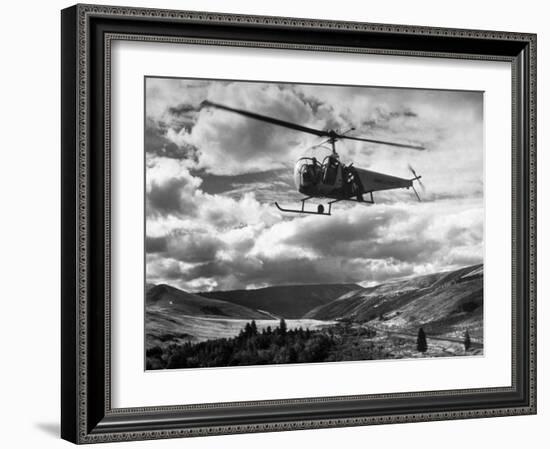 Helicopter Flying in Unidentified Location-Margaret Bourke-White-Framed Photographic Print