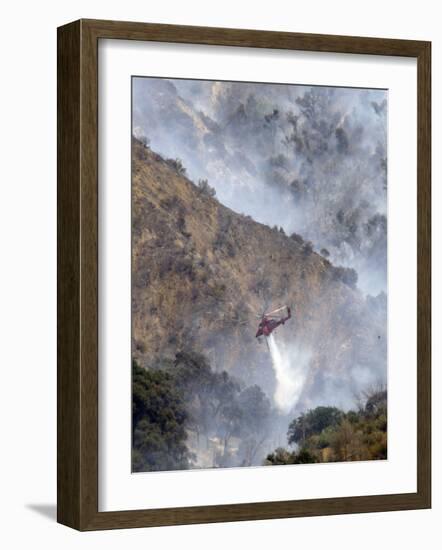 Helicopter Makes a Water Drop as Firefighters Battle a Wildfire in the San Gabriel Mountains-null-Framed Photographic Print