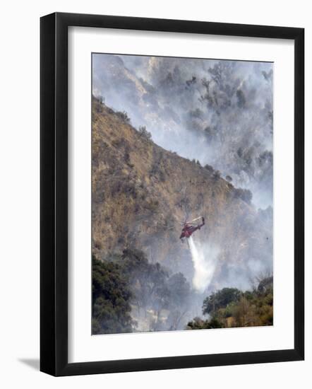 Helicopter Makes a Water Drop as Firefighters Battle a Wildfire in the San Gabriel Mountains-null-Framed Photographic Print