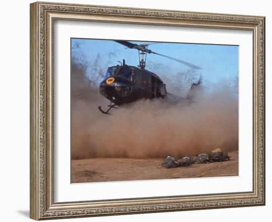 Helicopter Touching Down to Retrieve Bodies of Soldiers Killed in Firefight During the Vietnam War-Larry Burrows-Framed Photographic Print