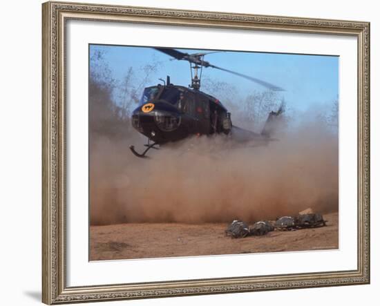 Helicopter Touching Down to Retrieve Bodies of Soldiers Killed in Firefight During the Vietnam War-Larry Burrows-Framed Photographic Print