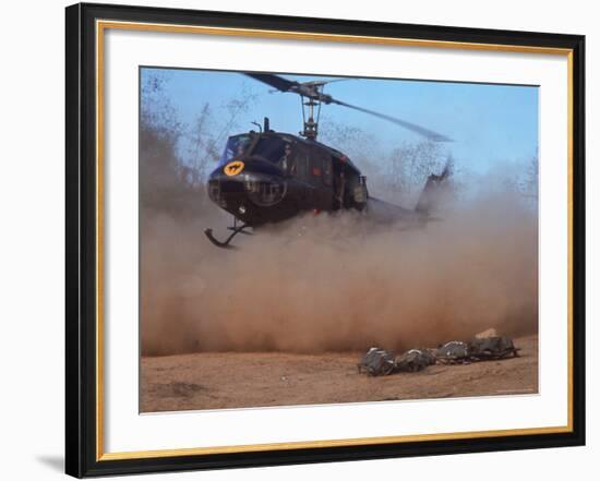 Helicopter Touching Down to Retrieve Bodies of Soldiers Killed in Firefight During the Vietnam War-Larry Burrows-Framed Photographic Print