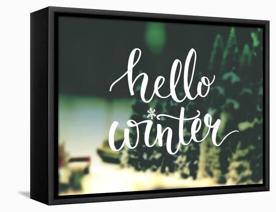 Hello Winter Typography Overlay on Blurred Photo of Christmas Trees. Lettering Banner for Greeting-kotoko-Framed Stretched Canvas