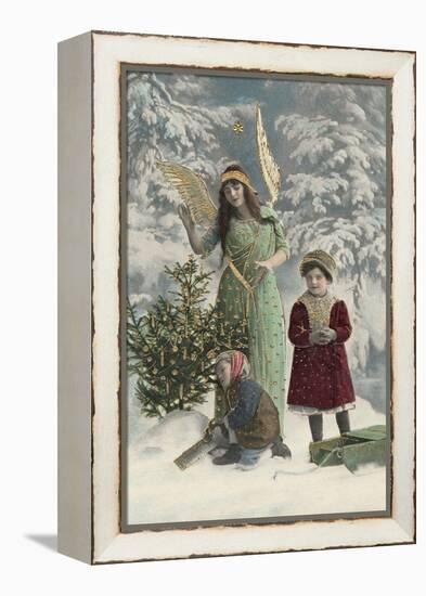 Helpful Angel Accompanies Two Children into the Woods to Help Them Choose Their Tree-null-Framed Premier Image Canvas