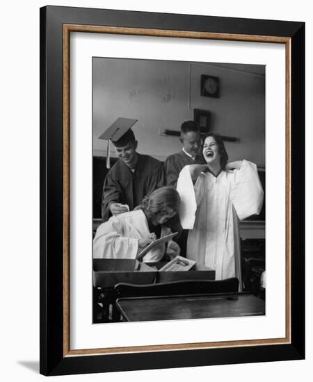 Hempstead High School Seniors Happily Helping Each Other with Graduation Gowns Before Commencement-Gordon Parks-Framed Premium Photographic Print