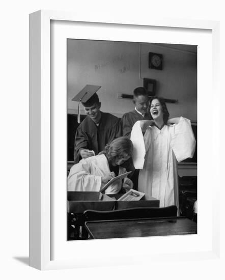 Hempstead High School Seniors Happily Helping Each Other with Graduation Gowns Before Commencement-Gordon Parks-Framed Photographic Print