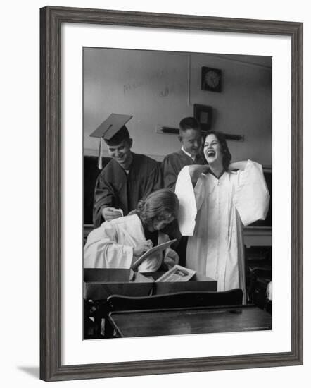 Hempstead High School Seniors Happily Helping Each Other with Graduation Gowns Before Commencement-Gordon Parks-Framed Photographic Print