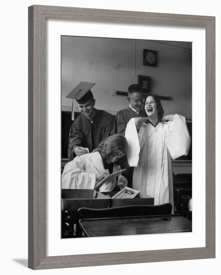 Hempstead High School Seniors Happily Helping Each Other with Graduation Gowns Before Commencement-Gordon Parks-Framed Photographic Print