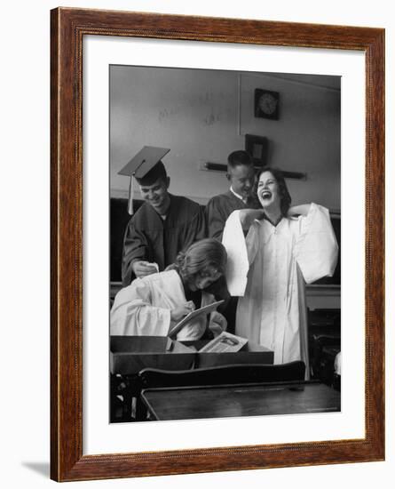 Hempstead High School Seniors Happily Helping Each Other with Graduation Gowns Before Commencement-Gordon Parks-Framed Photographic Print