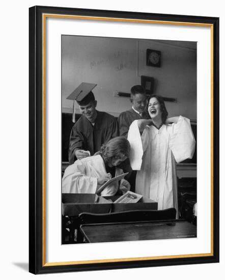 Hempstead High School Seniors Happily Helping Each Other with Graduation Gowns Before Commencement-Gordon Parks-Framed Photographic Print