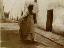 Voyage en Algérie : femme marchant dans une rue de Biskra-Henri Jacques Edouard Evenepoel-Framed Giclee Print