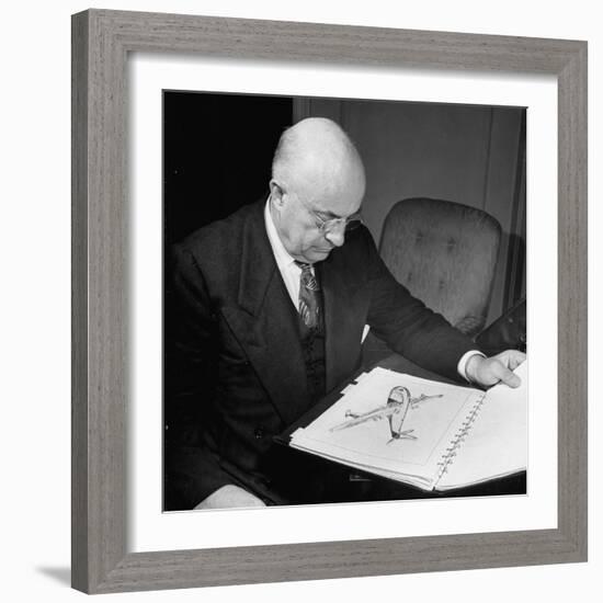 Henry J. Kaiser, Looking at Photographs of Airplanes-Myron Davis-Framed Photographic Print