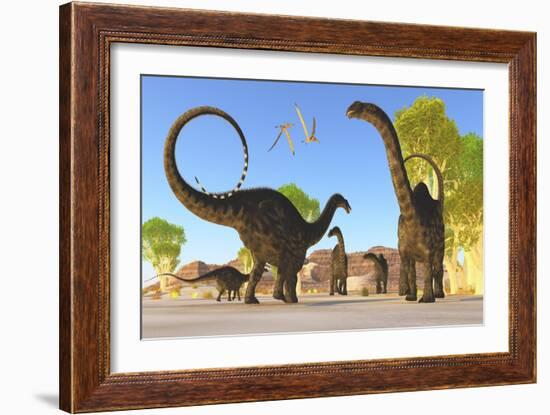 Herd of Apatosaurus Dinosaurs Wander Through a Prehistoric Forest-null-Framed Premium Giclee Print