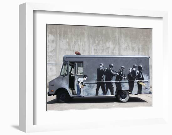 Hide-Banksy-Framed Art Print