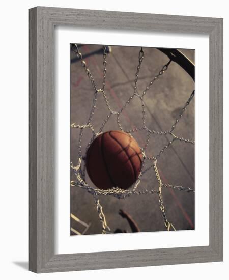 High Angle View of a Basketball in a Net-null-Framed Photographic Print