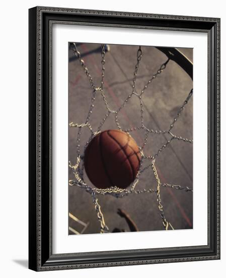 High Angle View of a Basketball in a Net-null-Framed Photographic Print