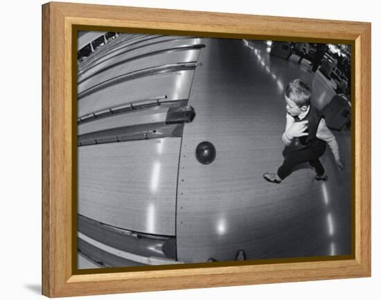 High Angle View of a Boy Bowling-null-Framed Premier Image Canvas
