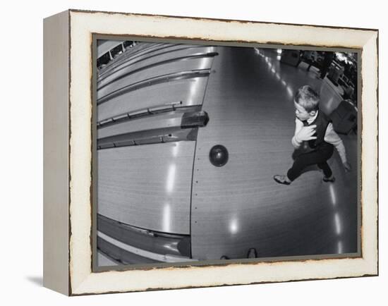 High Angle View of a Boy Bowling-null-Framed Premier Image Canvas